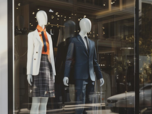 Image of two mannequins wearing suit jackets